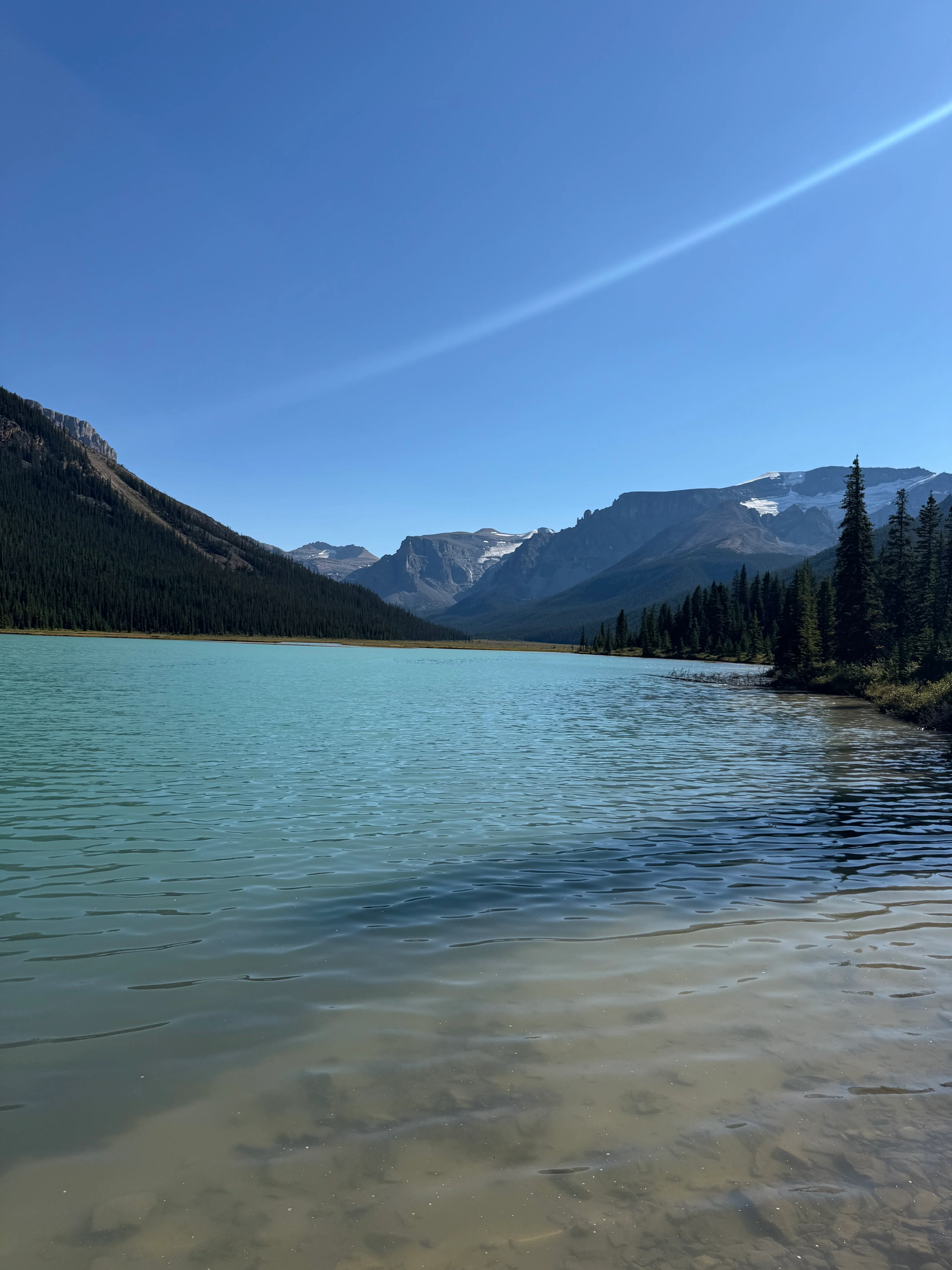 Isabella Lake with calm water and mountain backdrop