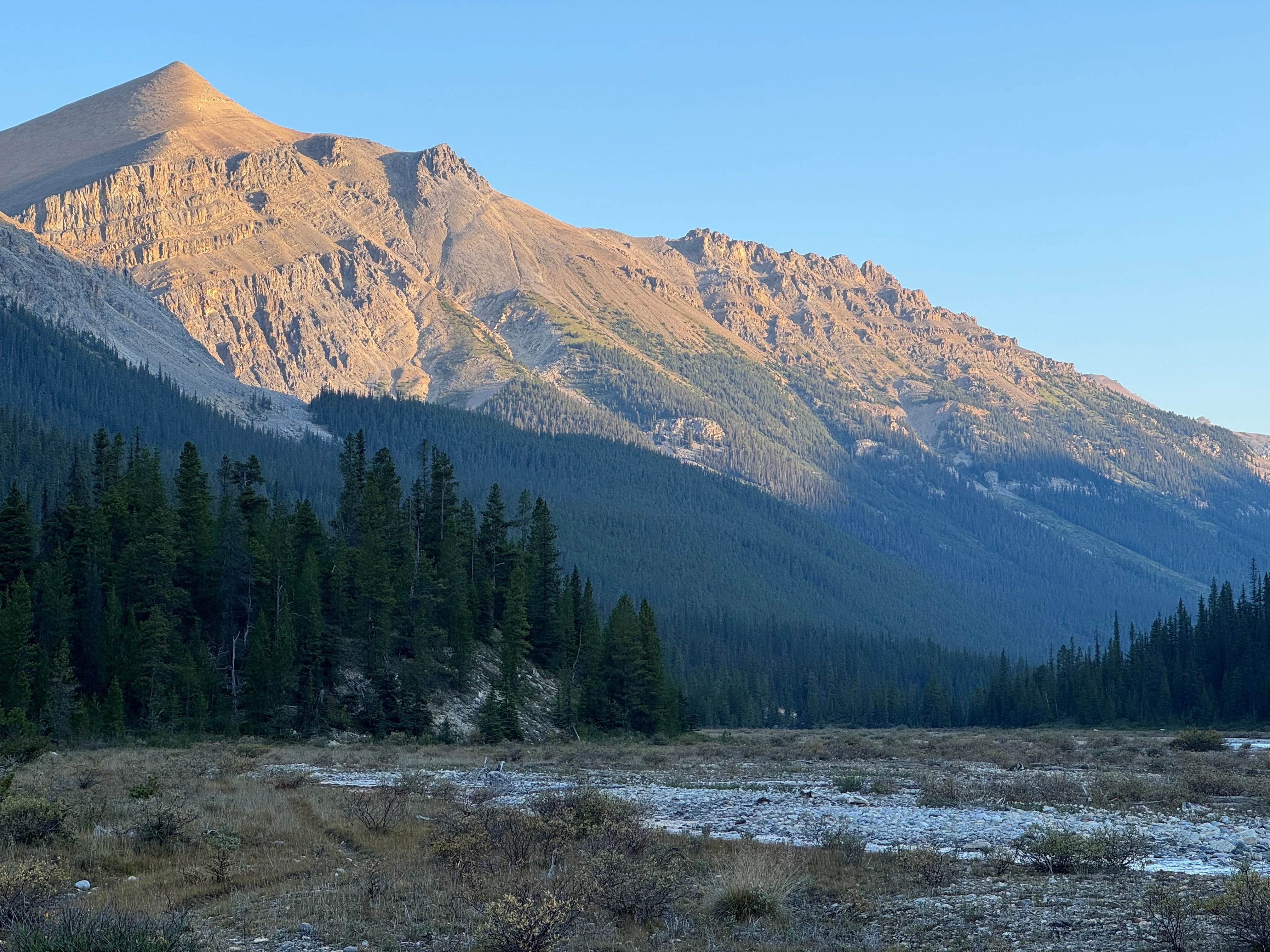 Early morning light with mountains still in shadow
